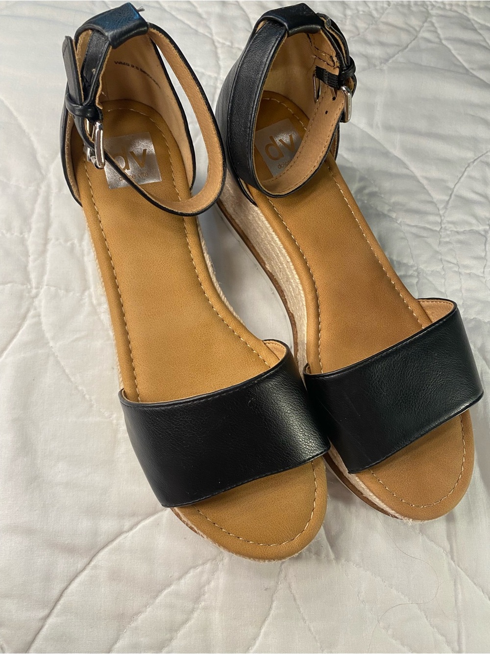 Dolce Vita Black and Tan Wedge Heels
/ Sandals 👡✨